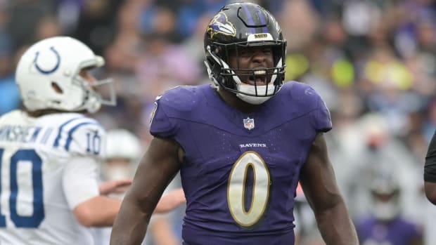 Baltimore Ravens LB Roquan Smith yells in celebration